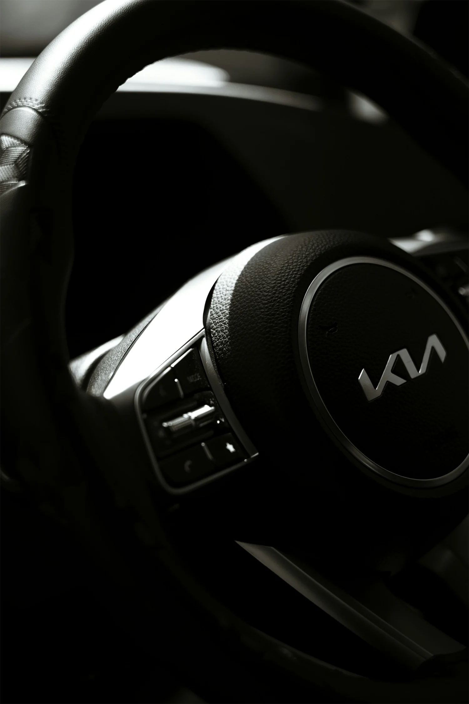 Kia steering wheel with logo interior detail