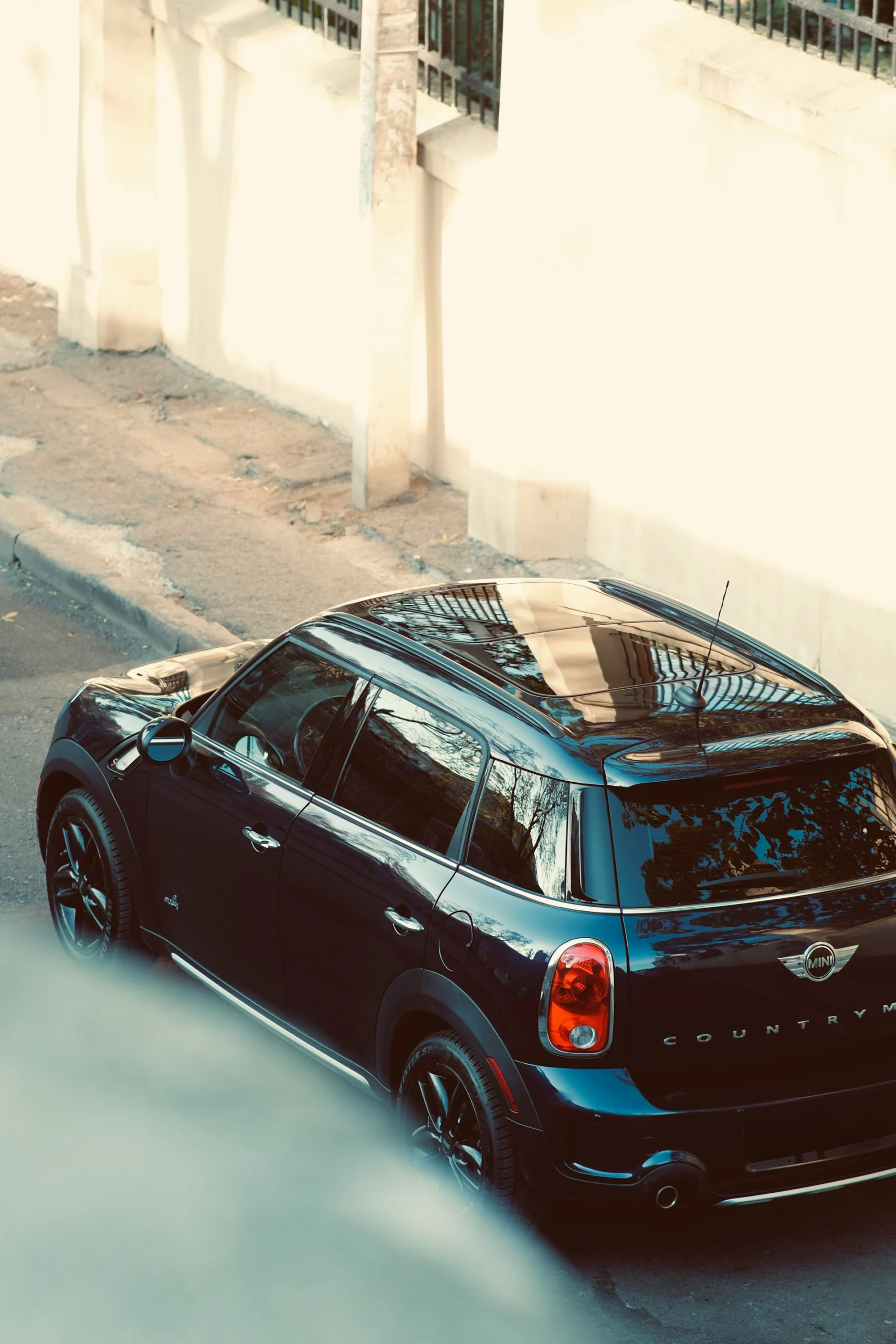 MINI Countryman parked on a street viewed from above