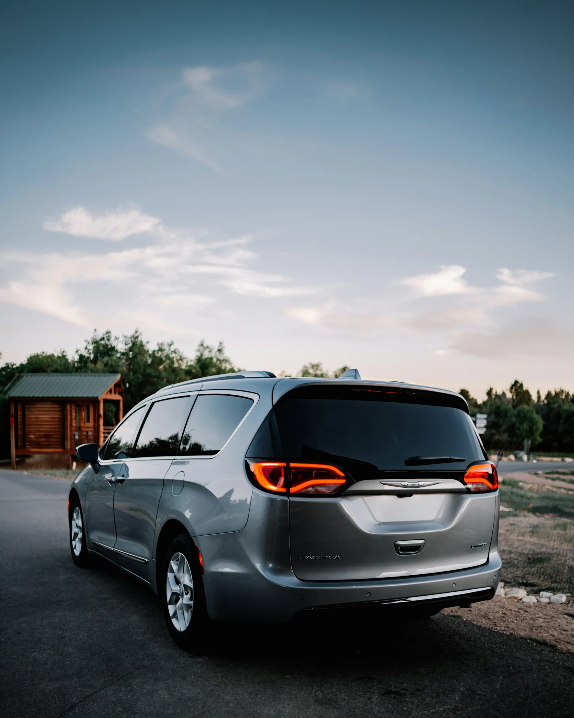 Chrysler Pacifica minivan rear view parked on road