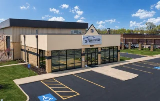DCR Systems Mentor collision repair facility exterior building and parking lot