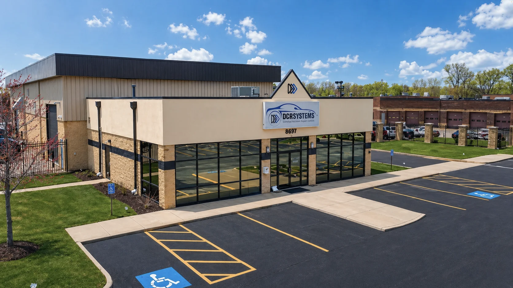 DCR Systems Mentor collision repair facility exterior building and parking lot