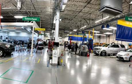 Collision repair shop floor with systems repair workflow areas at DCR Systems Mentor